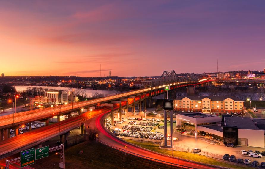 Highway interchange bridge at red dusk