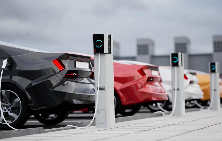 Generic electric car charging on a city street