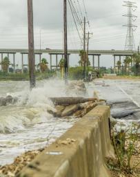 Water crashing over a road near Galveston Bay just outside of Houston Texas during Hurricane Harvey