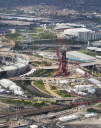 Aerial view of Queen Elizabeth Olympic Park in London, with views of stadium and other amenities.